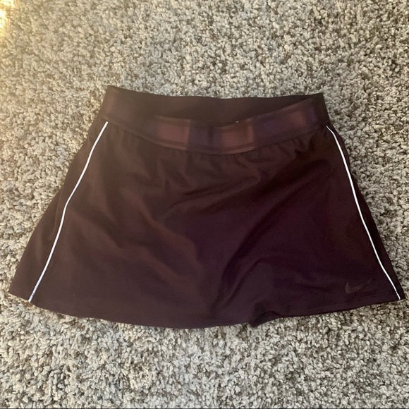 Nike Dresses & Skirts - Nike dri fit burgundy tennis skirt